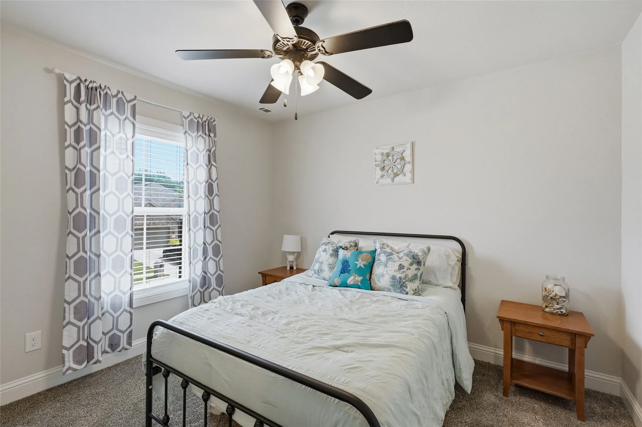 Upstairs Bedroom with window looking toward the front of the house