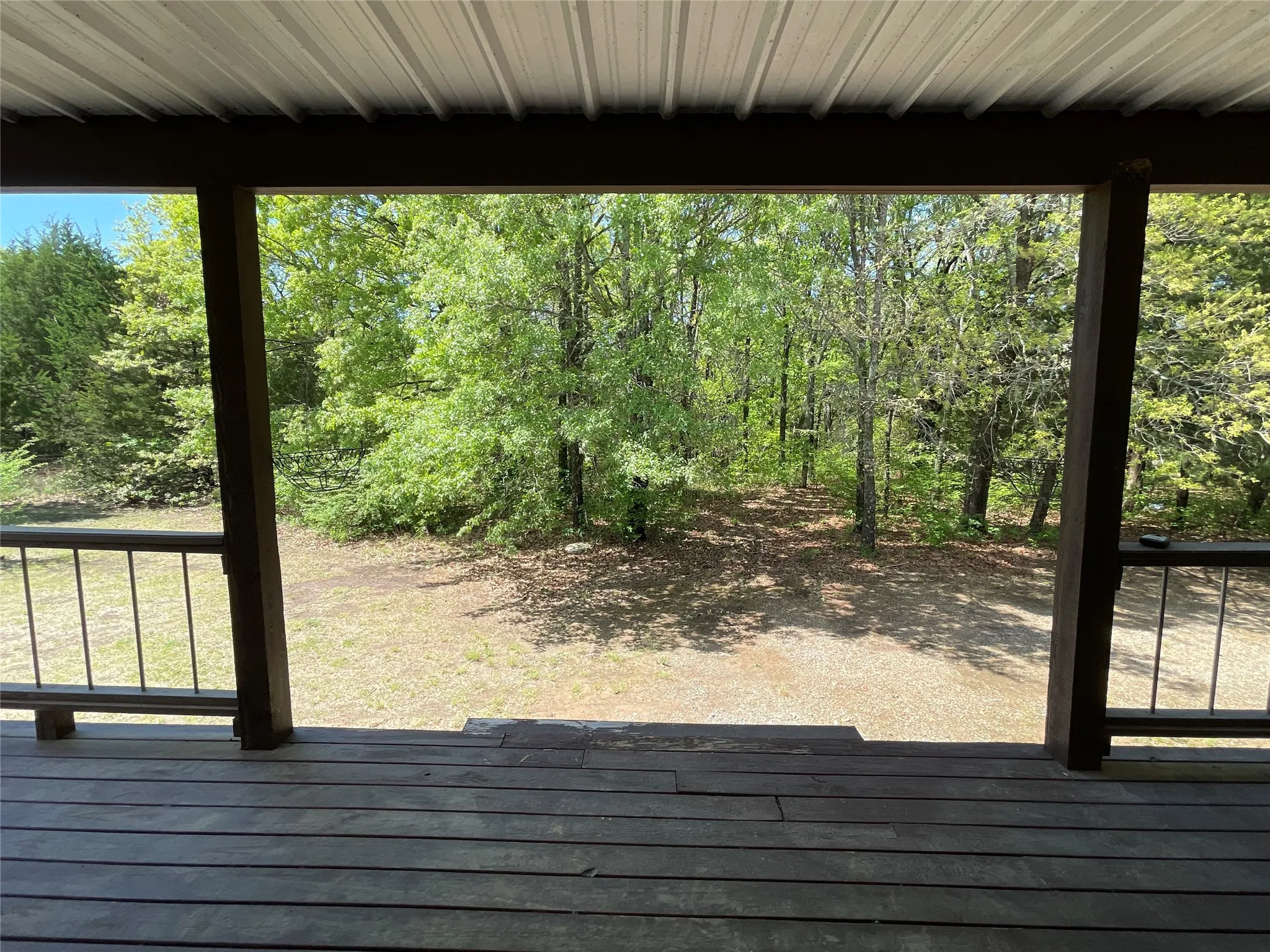 Huge 35x8 front porch with railing all around, front steps
