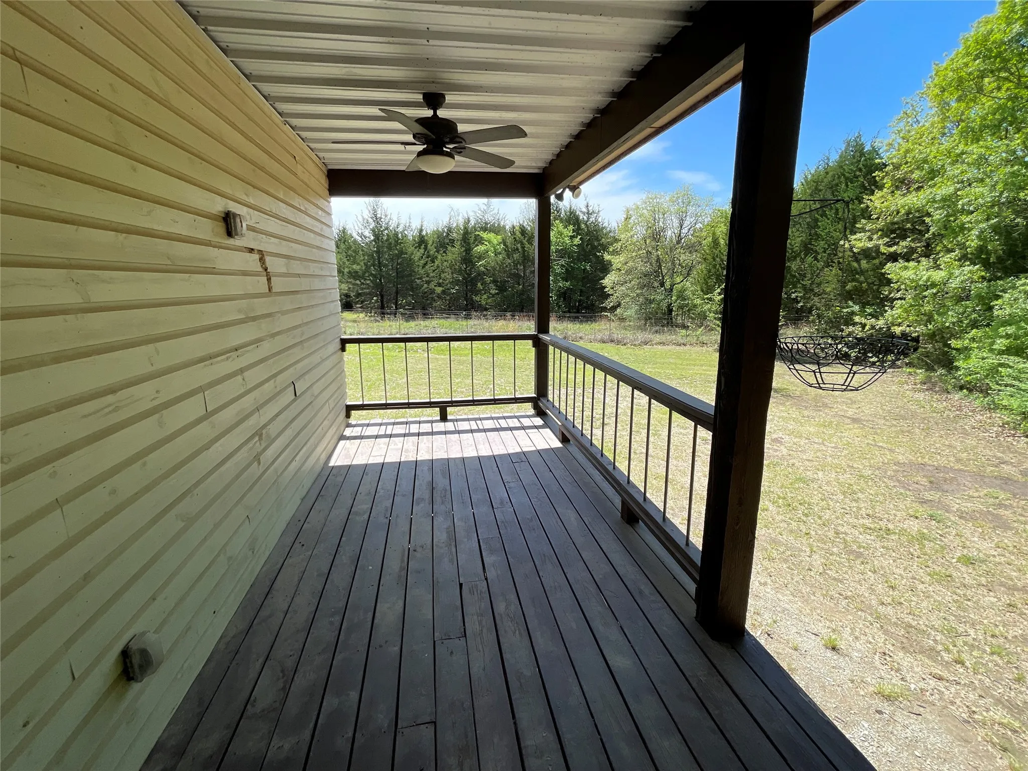 Huge 35x8 front porch with railing all around