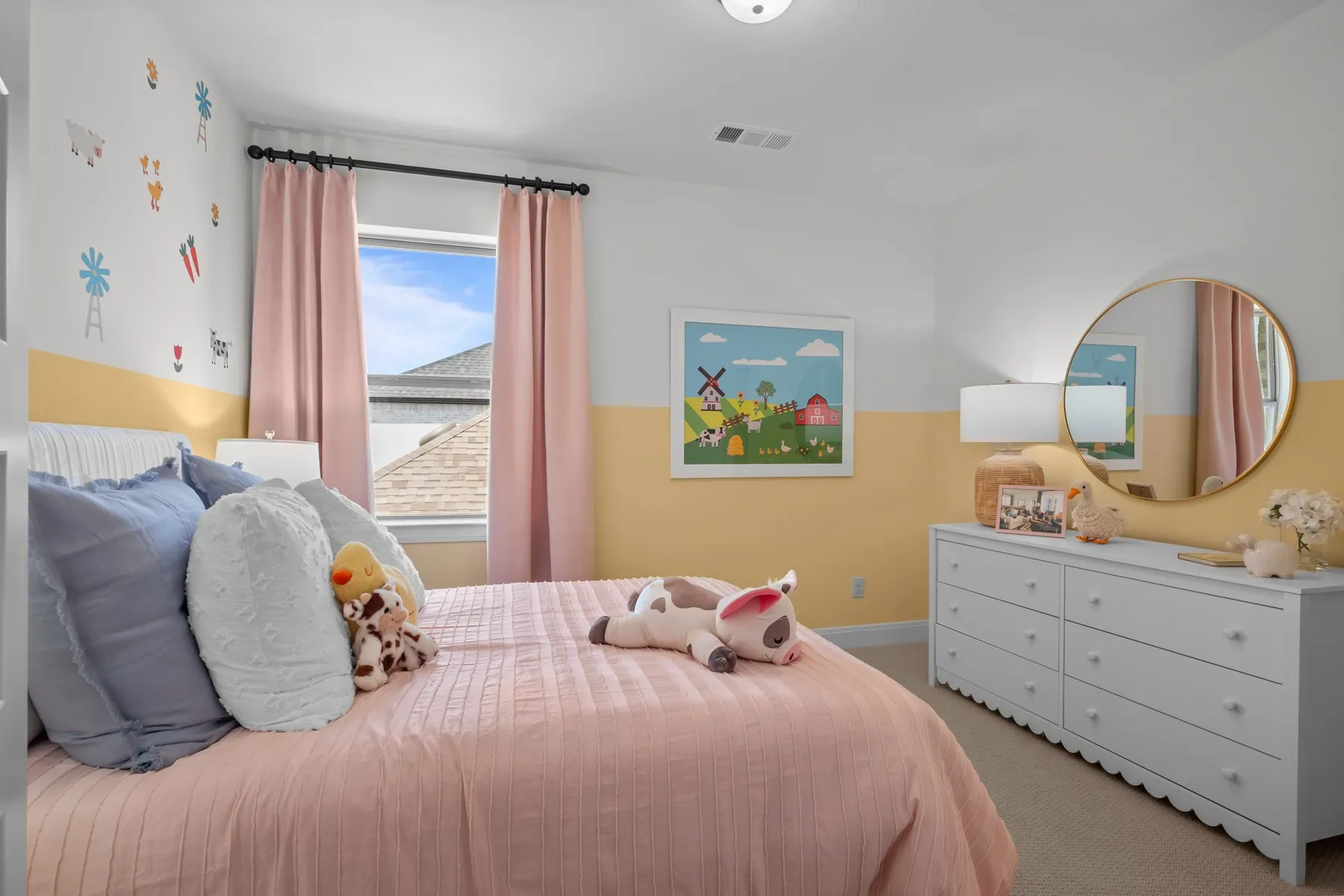 Bedroom with light carpet and baseboards
