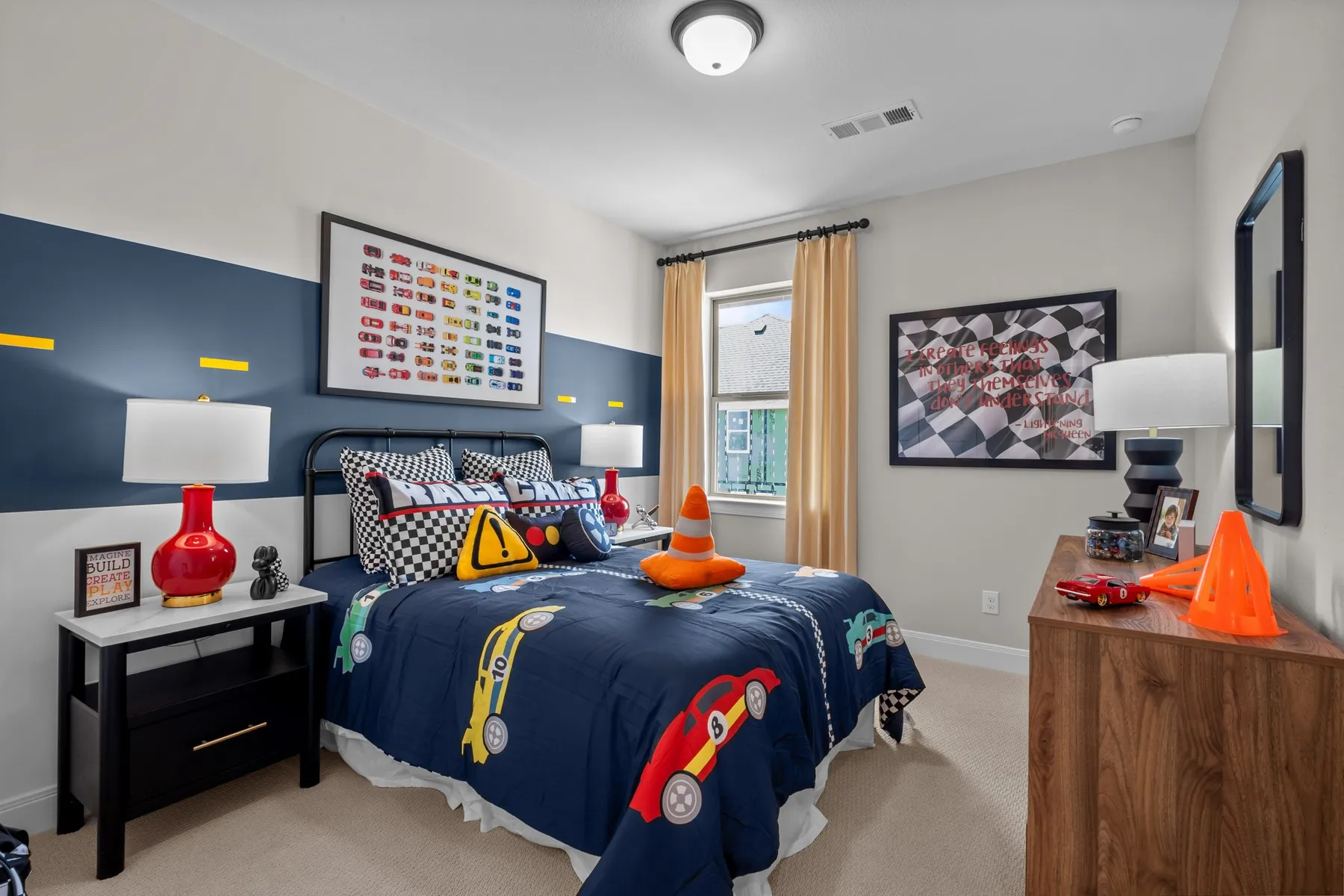 Bedroom with light carpet and baseboards