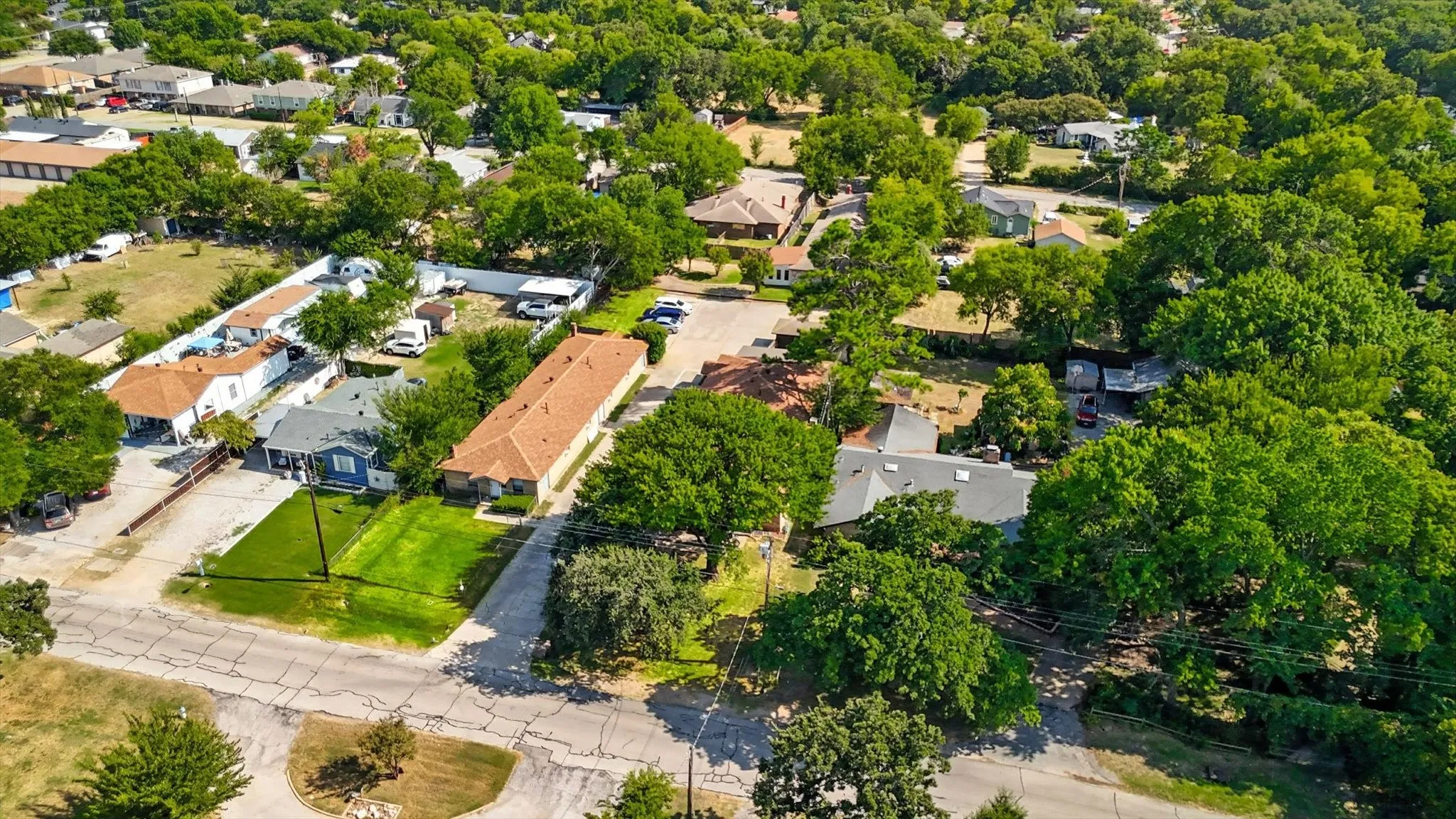 View of property location with nearby suburban area