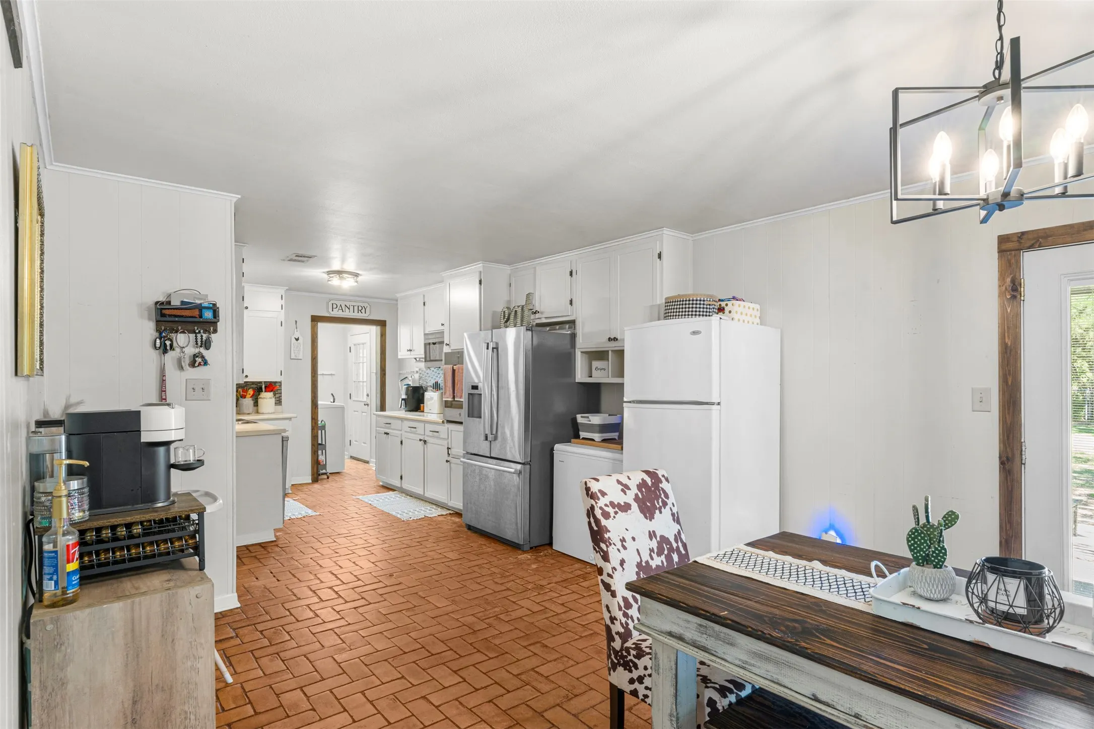 Kitchen with brick floors