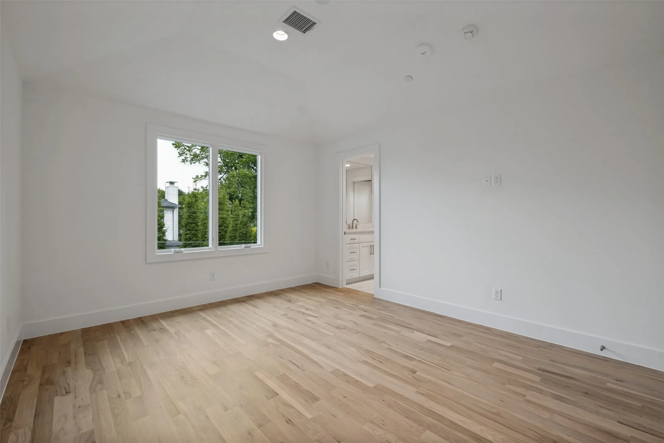White oak hardwood floors in all 3 upstairs bedrooms and throughout both floors
