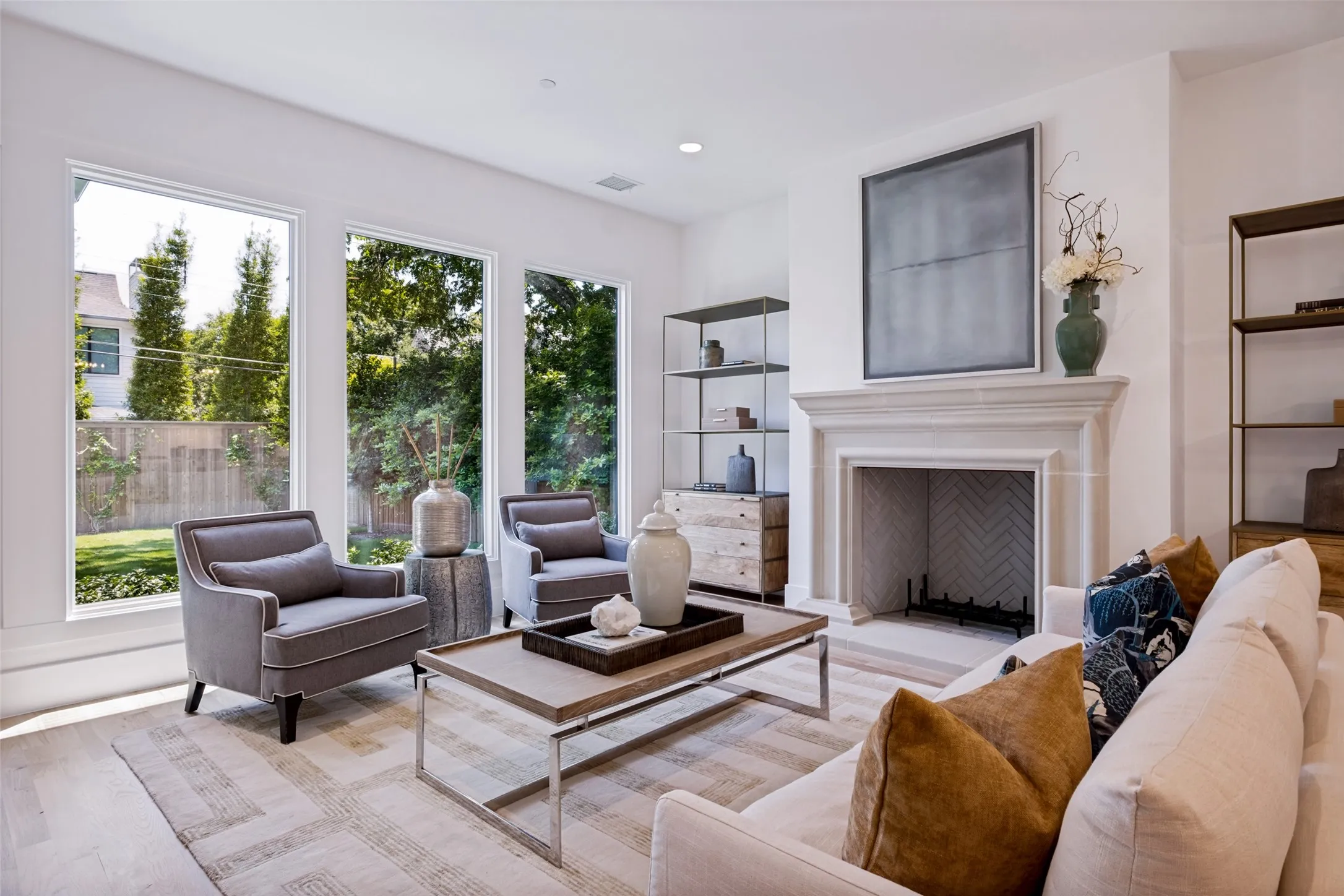 This Living area opens to the attractive gourmet kitchen, an inviting space that will be a favorite for comfortable living and gracious entertaining.