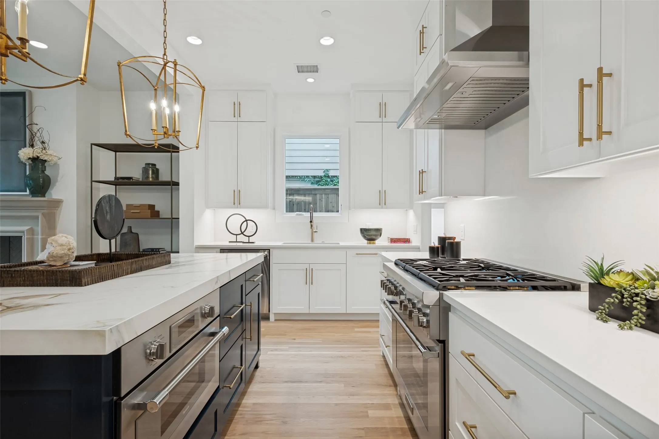 Thermador 6 gas burner range with electric oven and a Thermador Professional Speed Oven. Zephyr Sienna Pro Wall Vent Hood