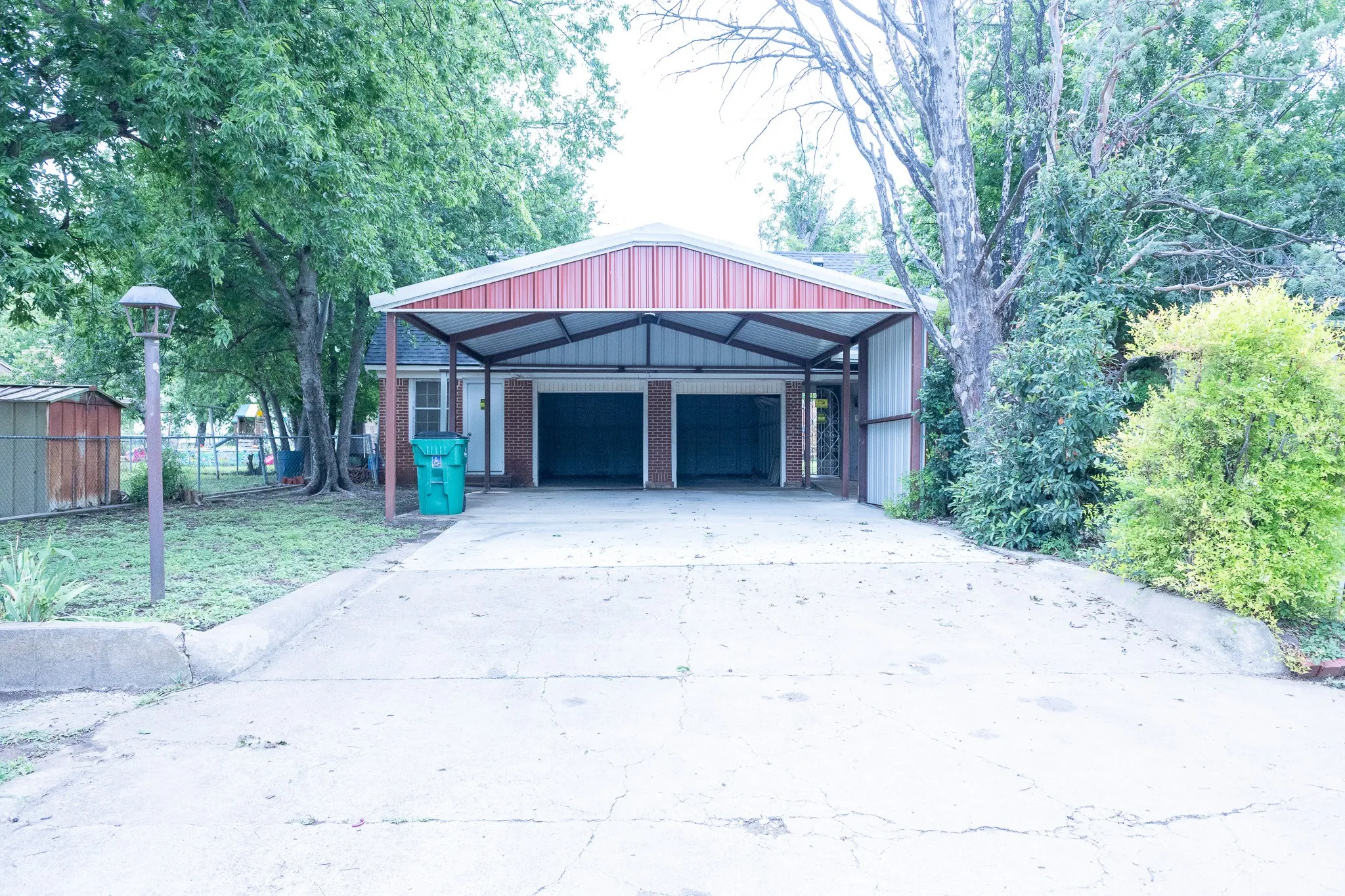 2-Car Garage, 2-Car Carport and Guest Quarters