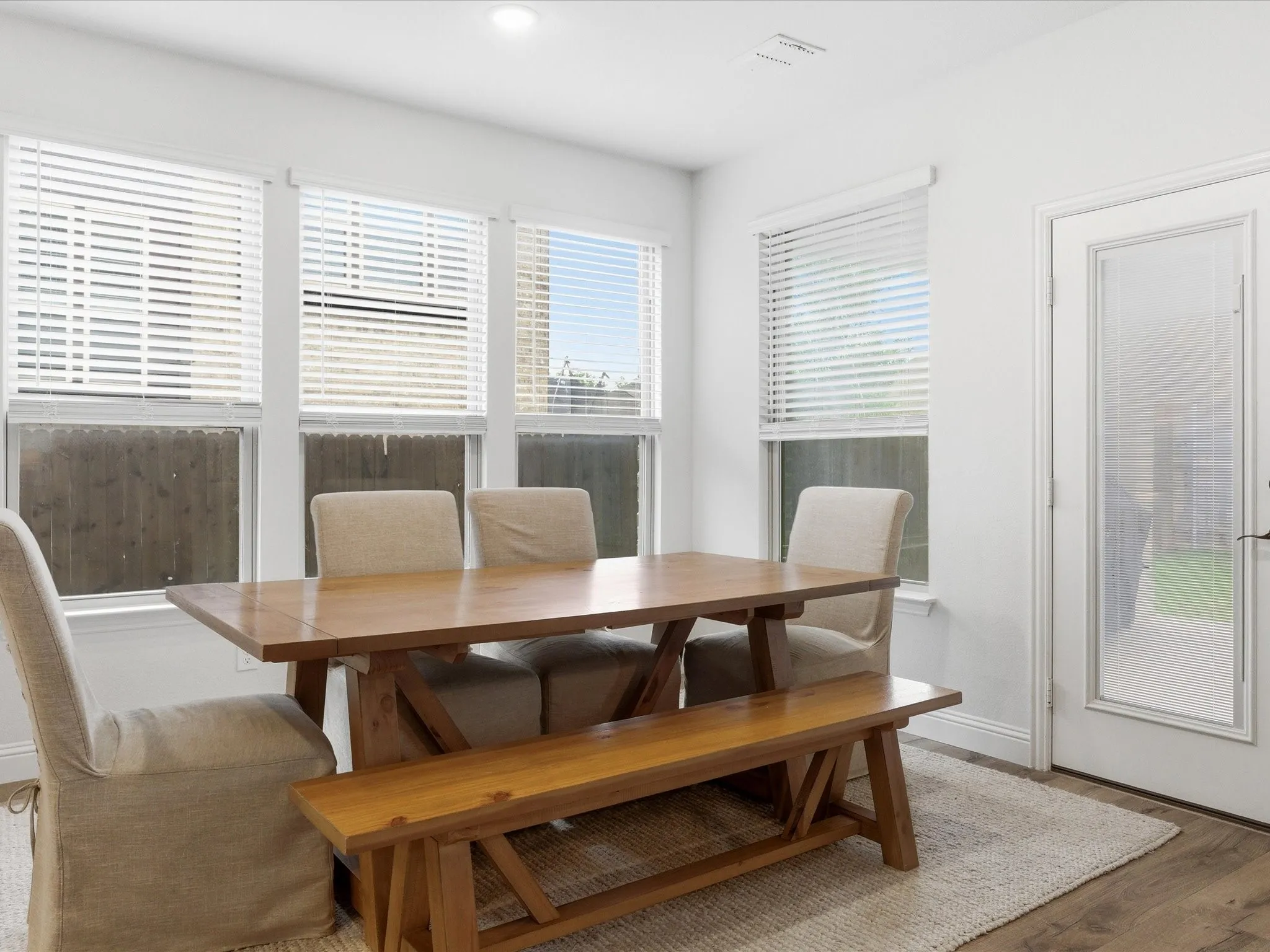 Dining space featuring baseboards and light wood-type flooring