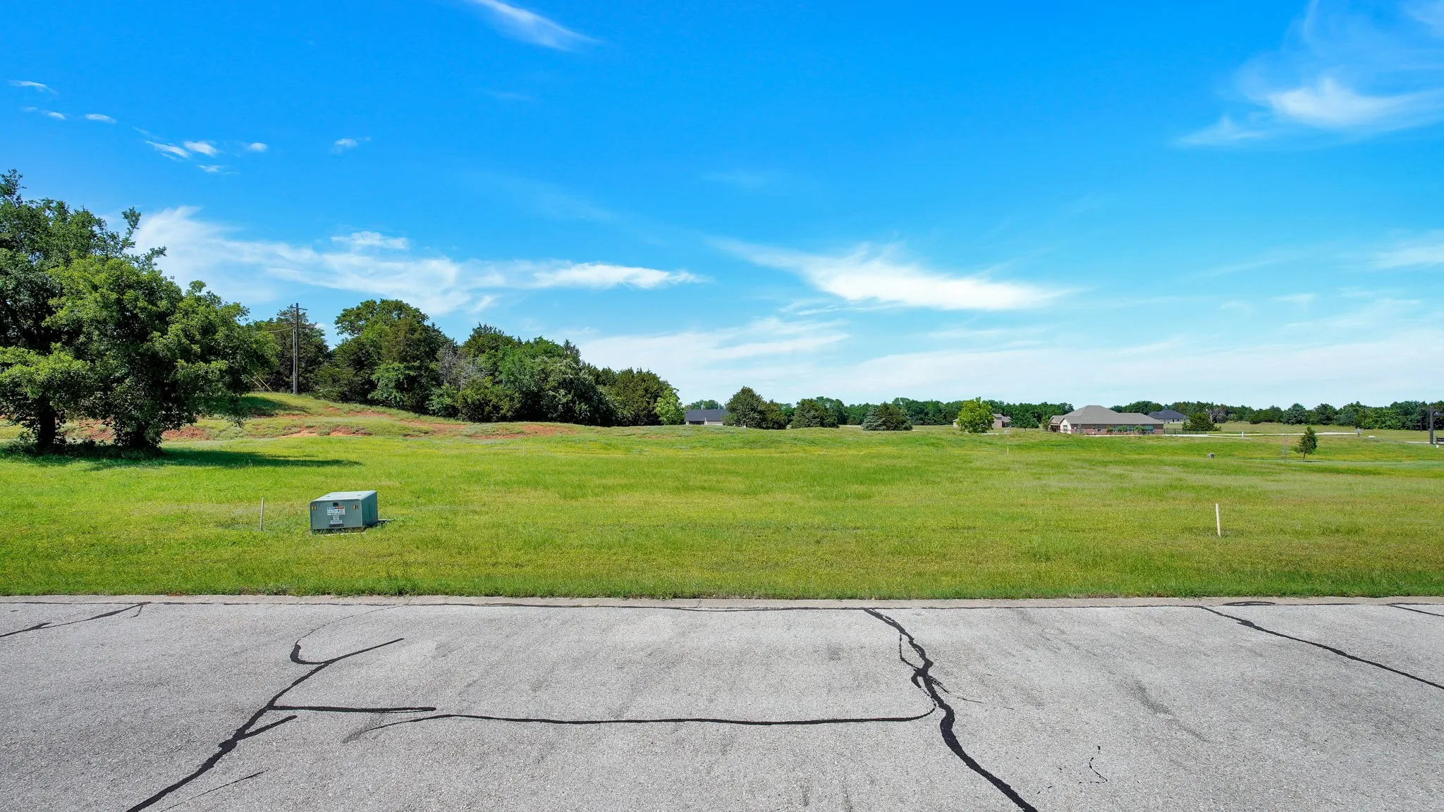 View of grassy yard with a view of rural / pastoral area