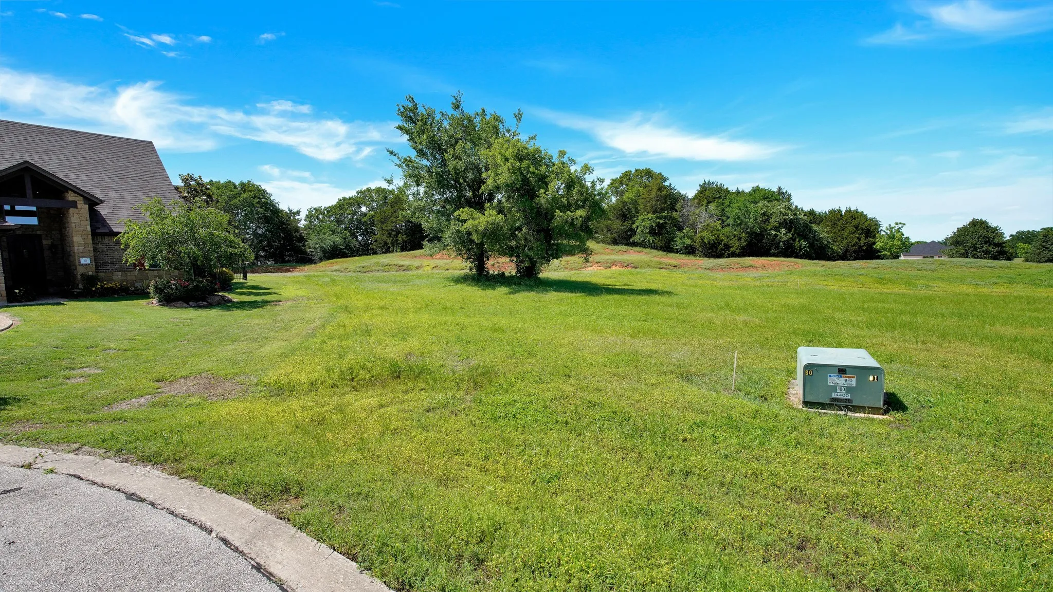 View of green lawn featuring a rural view