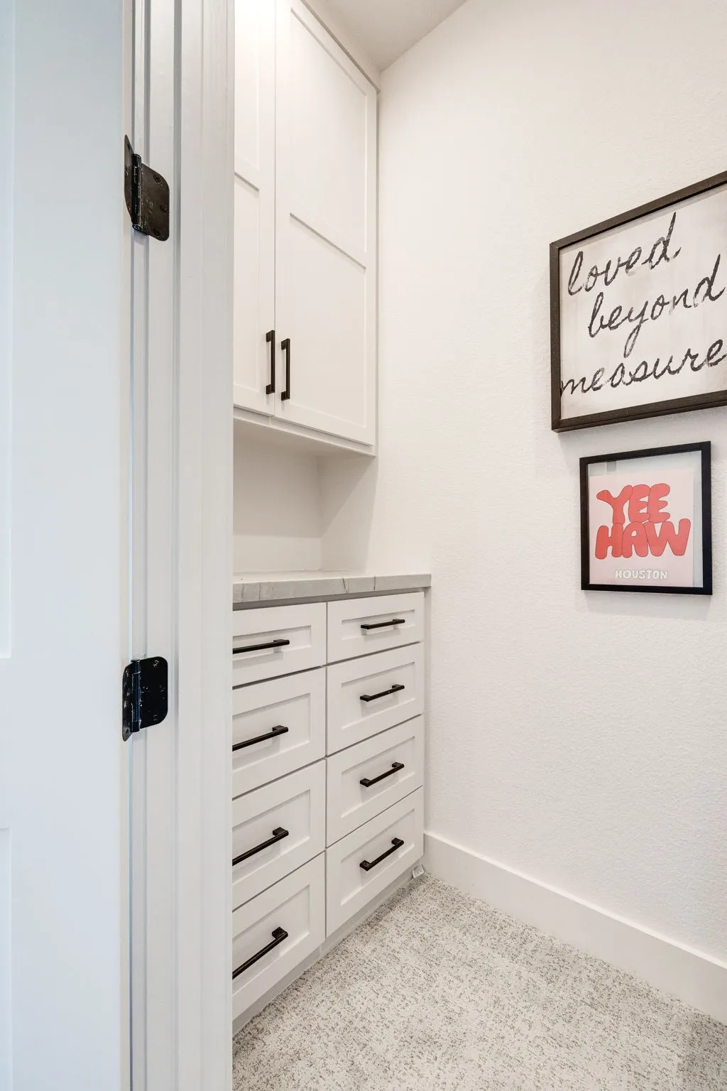 Detailed view of baseboards and carpet floors