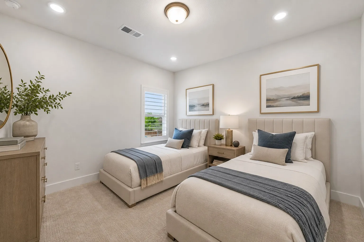 Virtual staging Recessed lighting and a central ceiling light fixture illuminate this room with light-toned wall paint