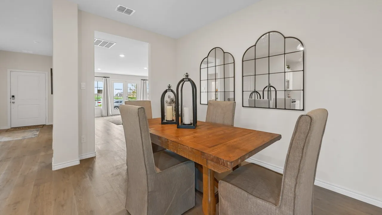 Dining room featuring wood finished floors and recessed lighting
