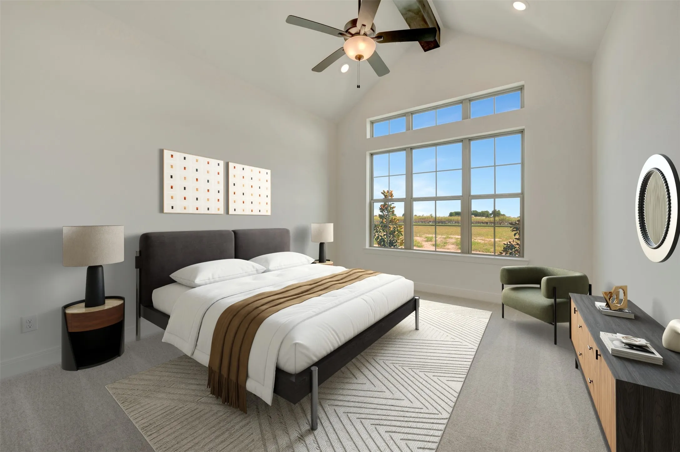 Vaulted ceiling bedroom featuring a large picture window with transoms, recessed lighting, and a ceiling fan with integrated light