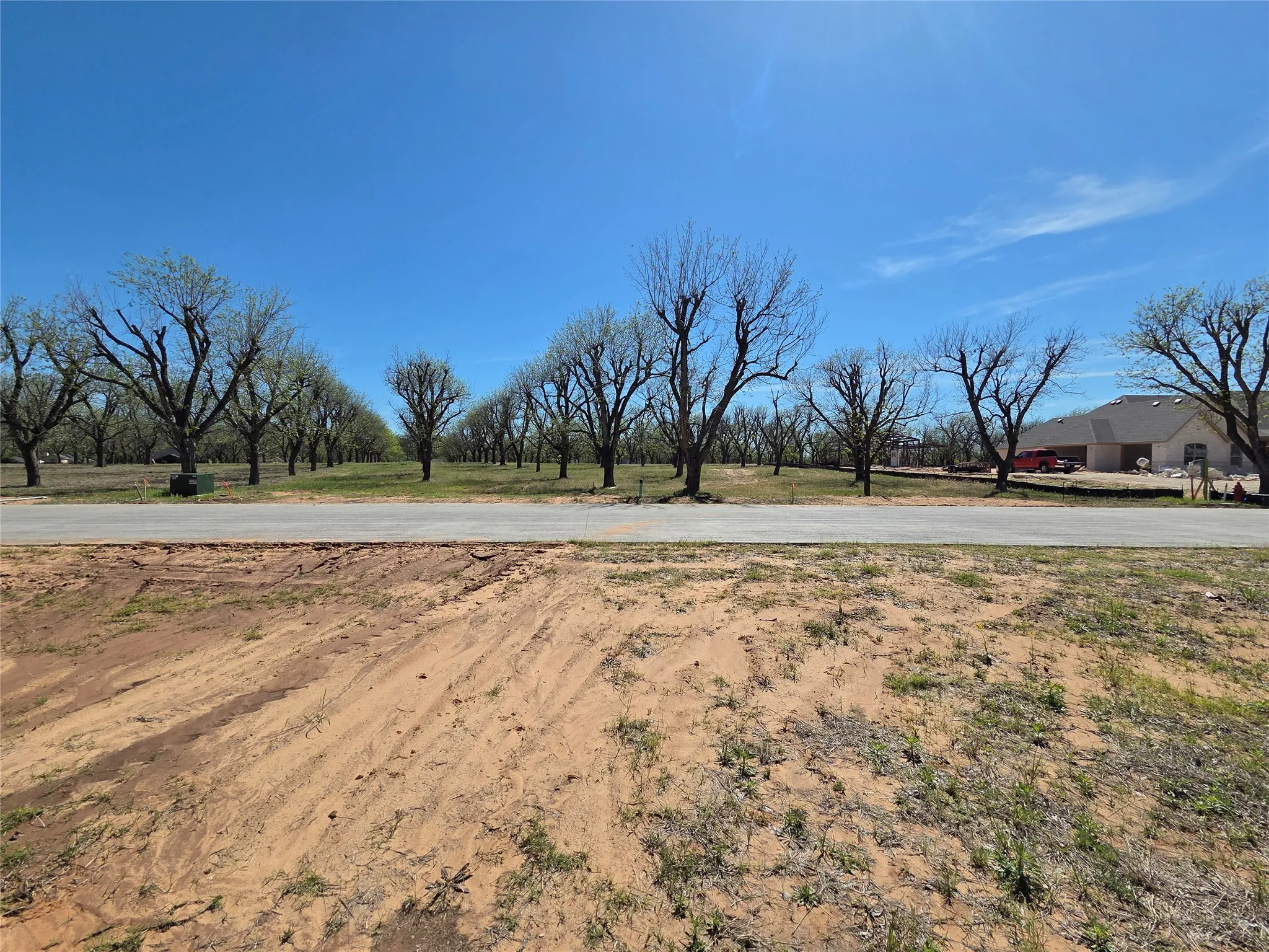 View from across the street.  130 ft of road frontage.