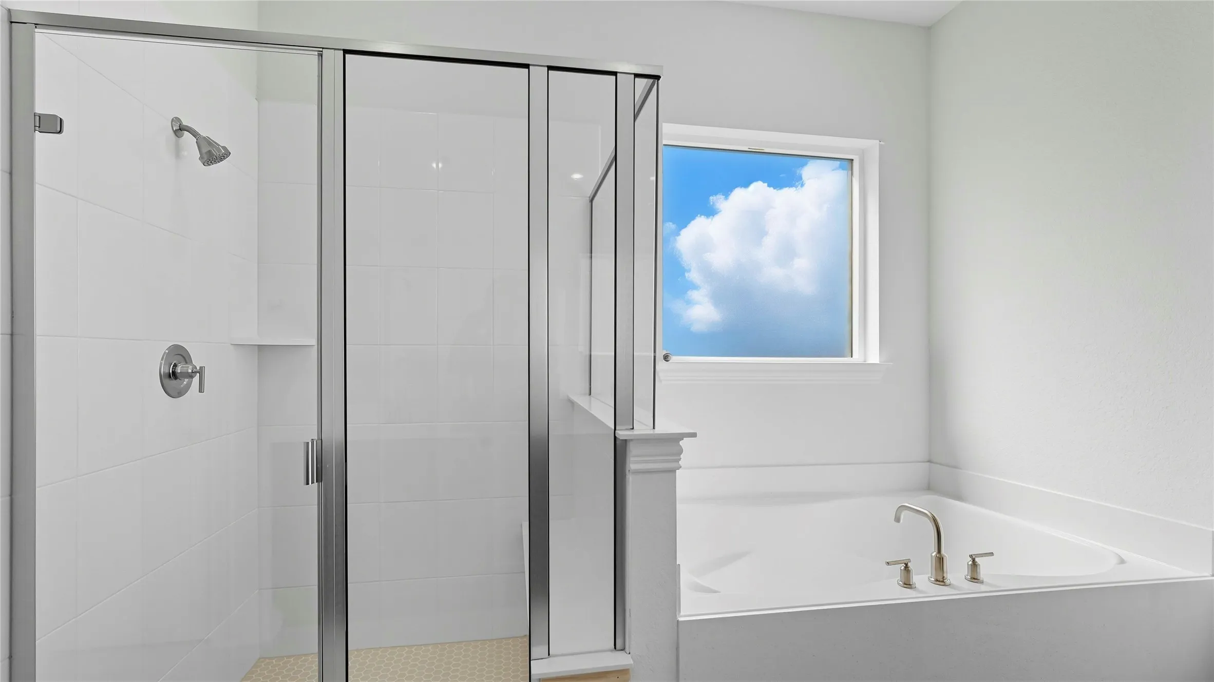 Full bathroom with a shower stall and a bath
