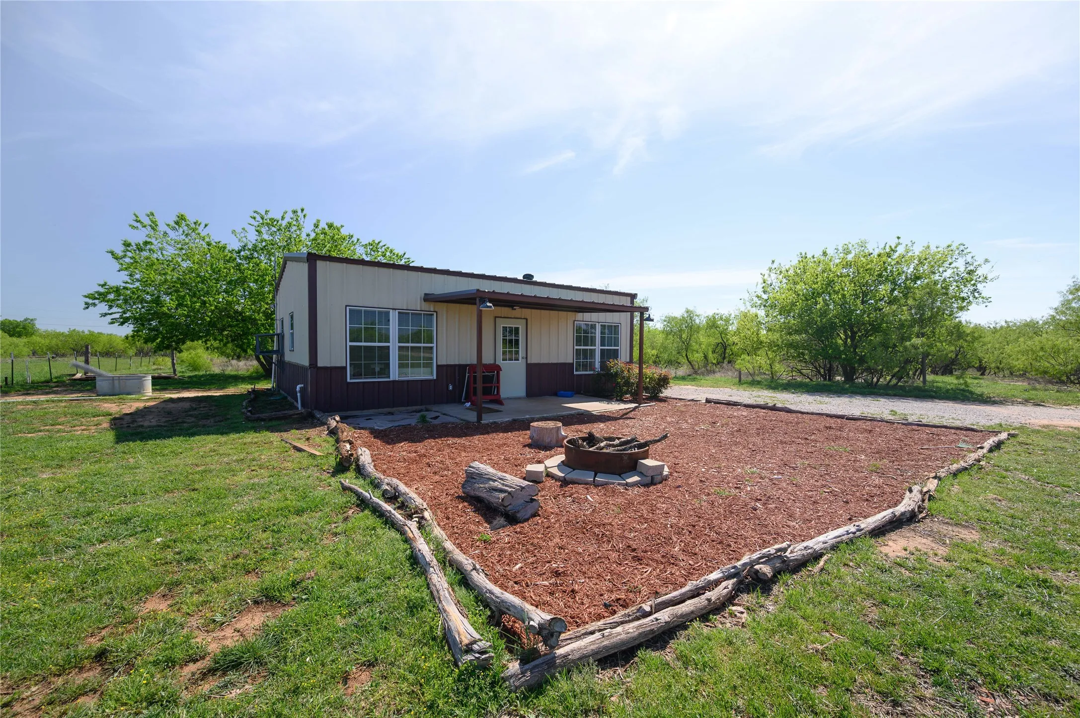 Barndominium with Lovely Landscaping