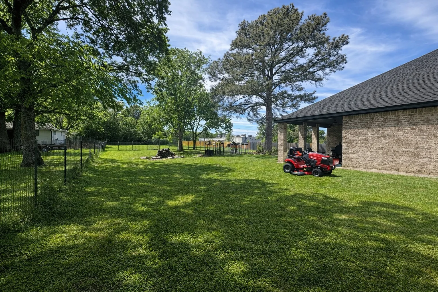 View of fenced backyard