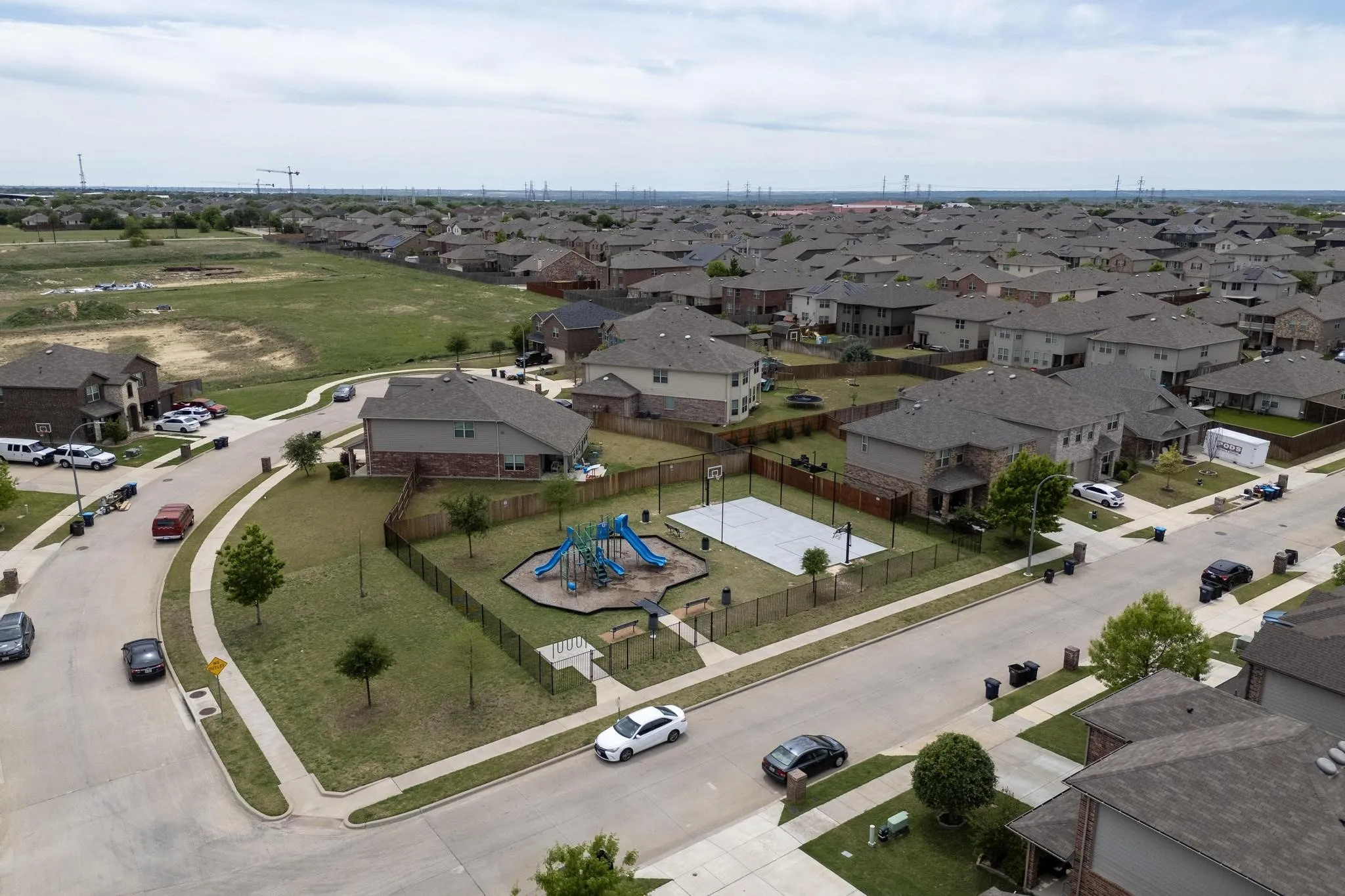 Aerial view of residential area with a community park