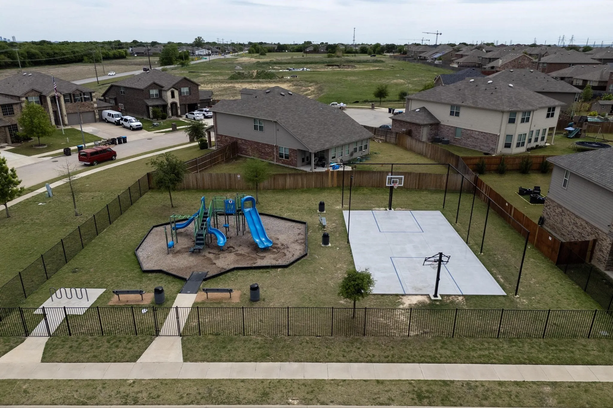 Aerial perspective of suburban area featuring a community park
