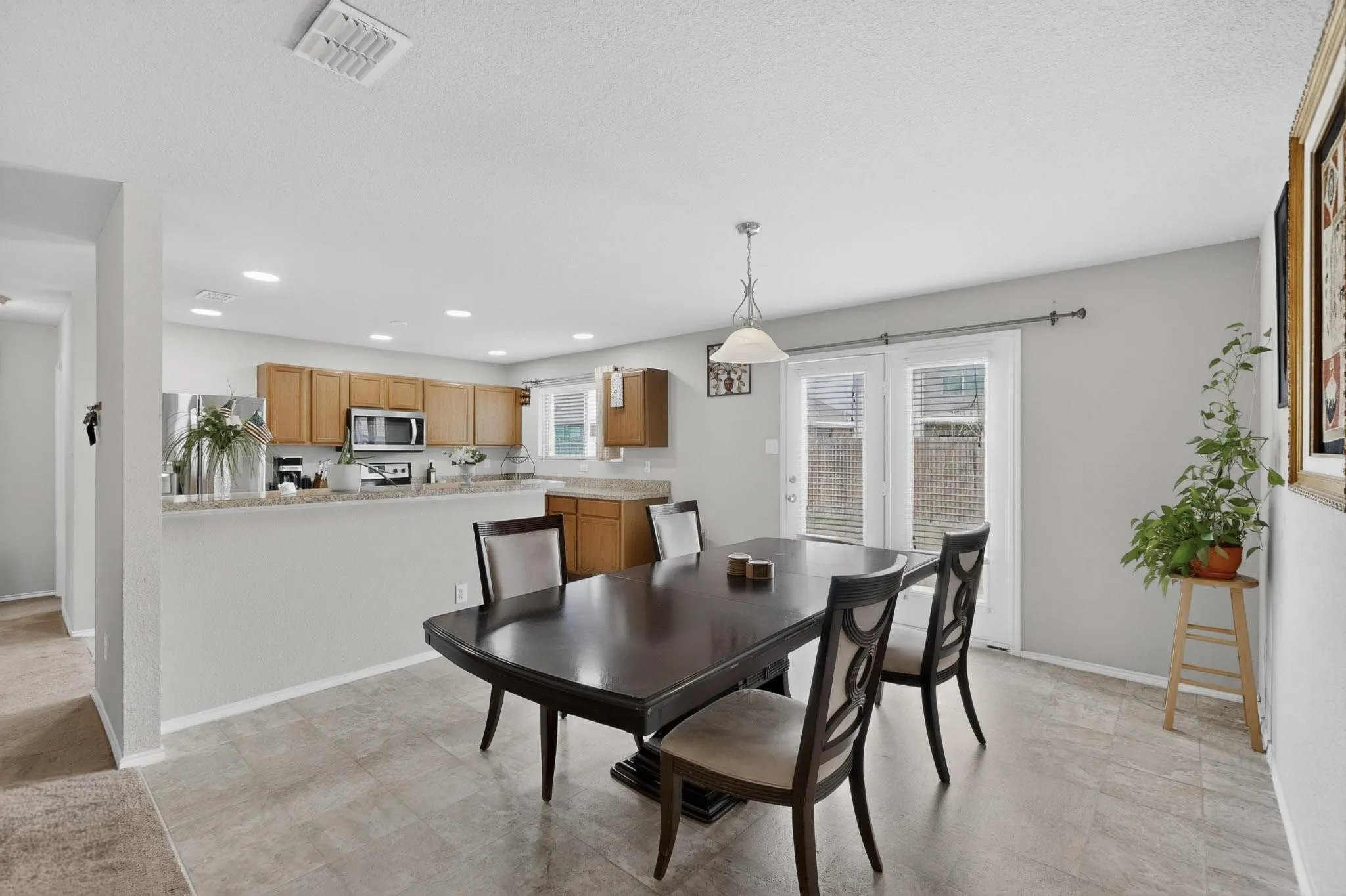Dining room featuring baseboards and recessed lighting