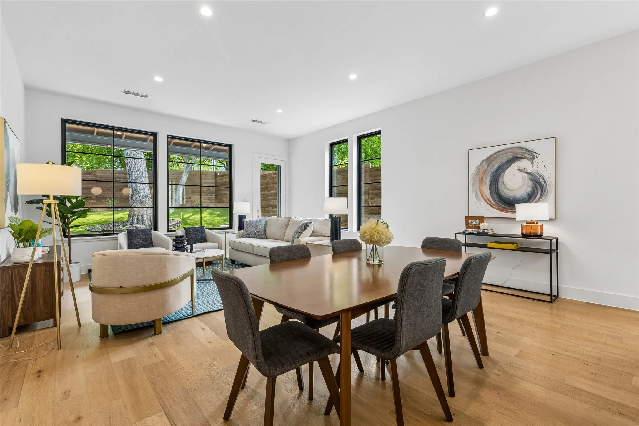 Dining room featuring light wood-style floors and recessed lighting