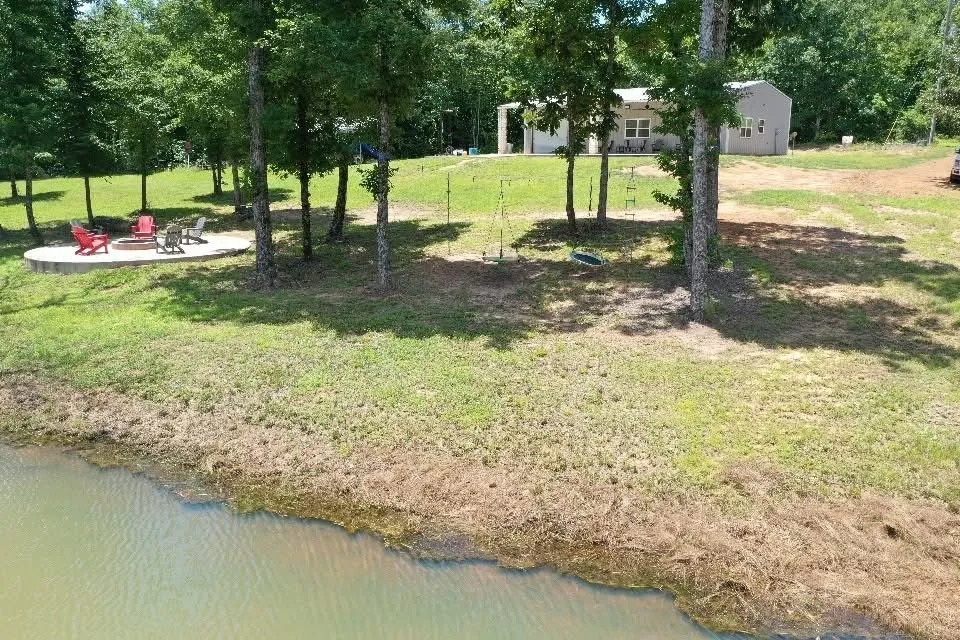 Single Family Residence For Sale in Morris County , 2409 County Road 2303, Lone Star, Texas 75668, 2 Bedrooms, 1 Bathroom, 2 Garage spaces, 1,225 Sqft, built in 2023, Preowned, Price $875,000, mls#21233581, Real Estate Agent in Lone Star, Homes For Sale in Morris county, Homes For Sale in Lone Star, Realtor in Lone Star Texas, Real Estate Brokerage Independent Realty Texas, Luminita Cordes Realtor
