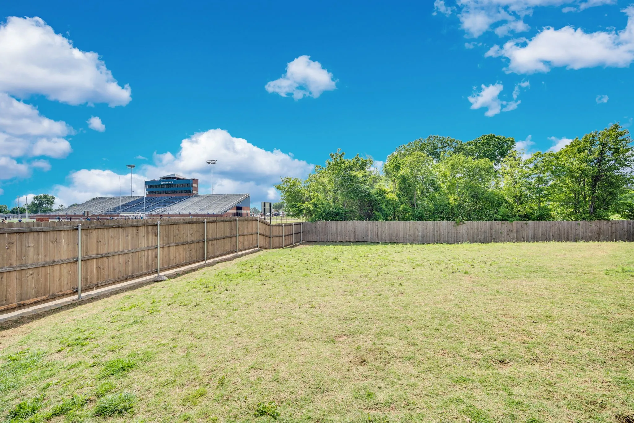 Huge backyard overlook Joshua ISD Stadium