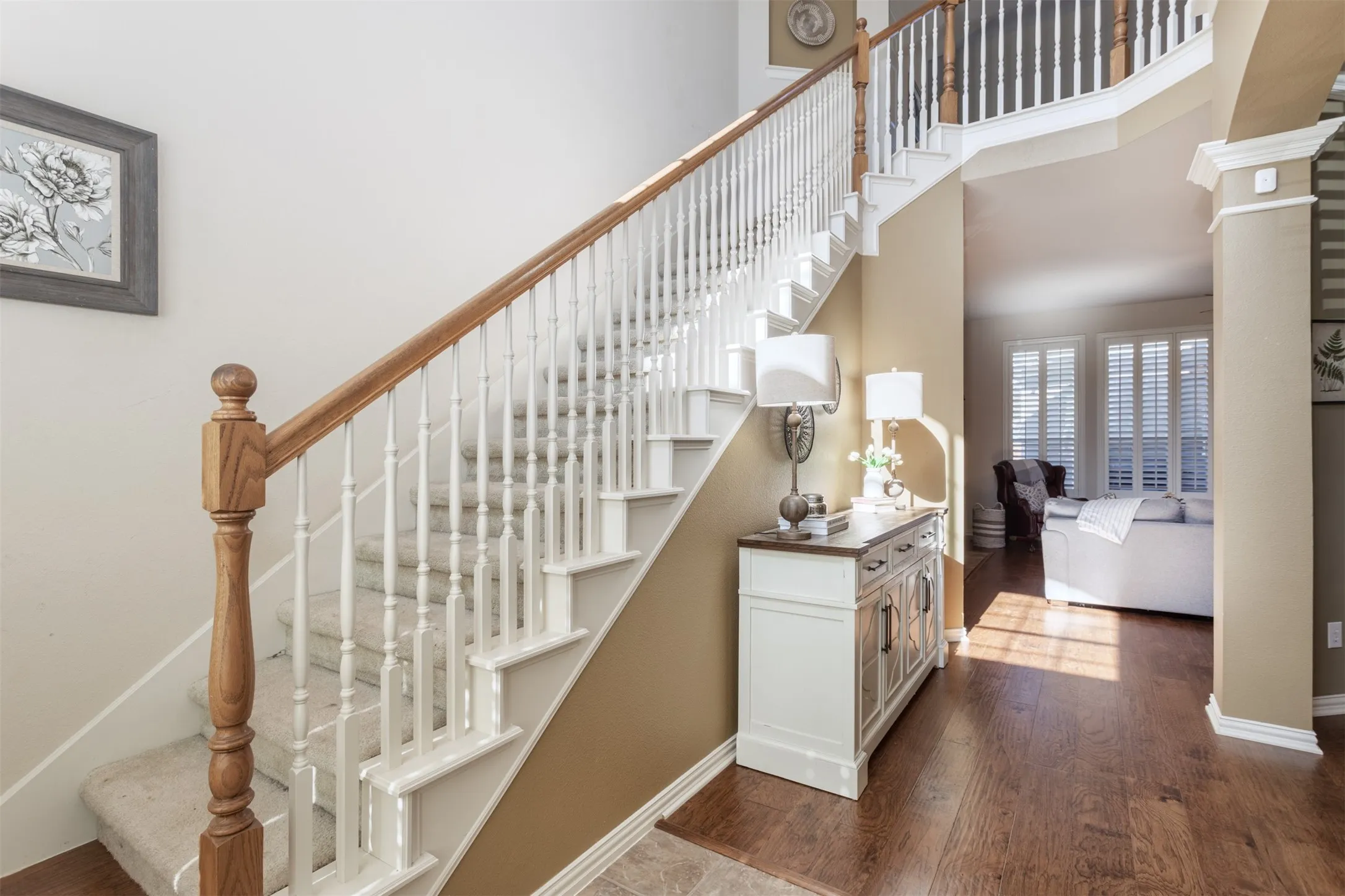Glad you're here! This home has absolutely everything you need! Stunning hardwood floors, soaring ceilings and a grand entrance. So lovely!