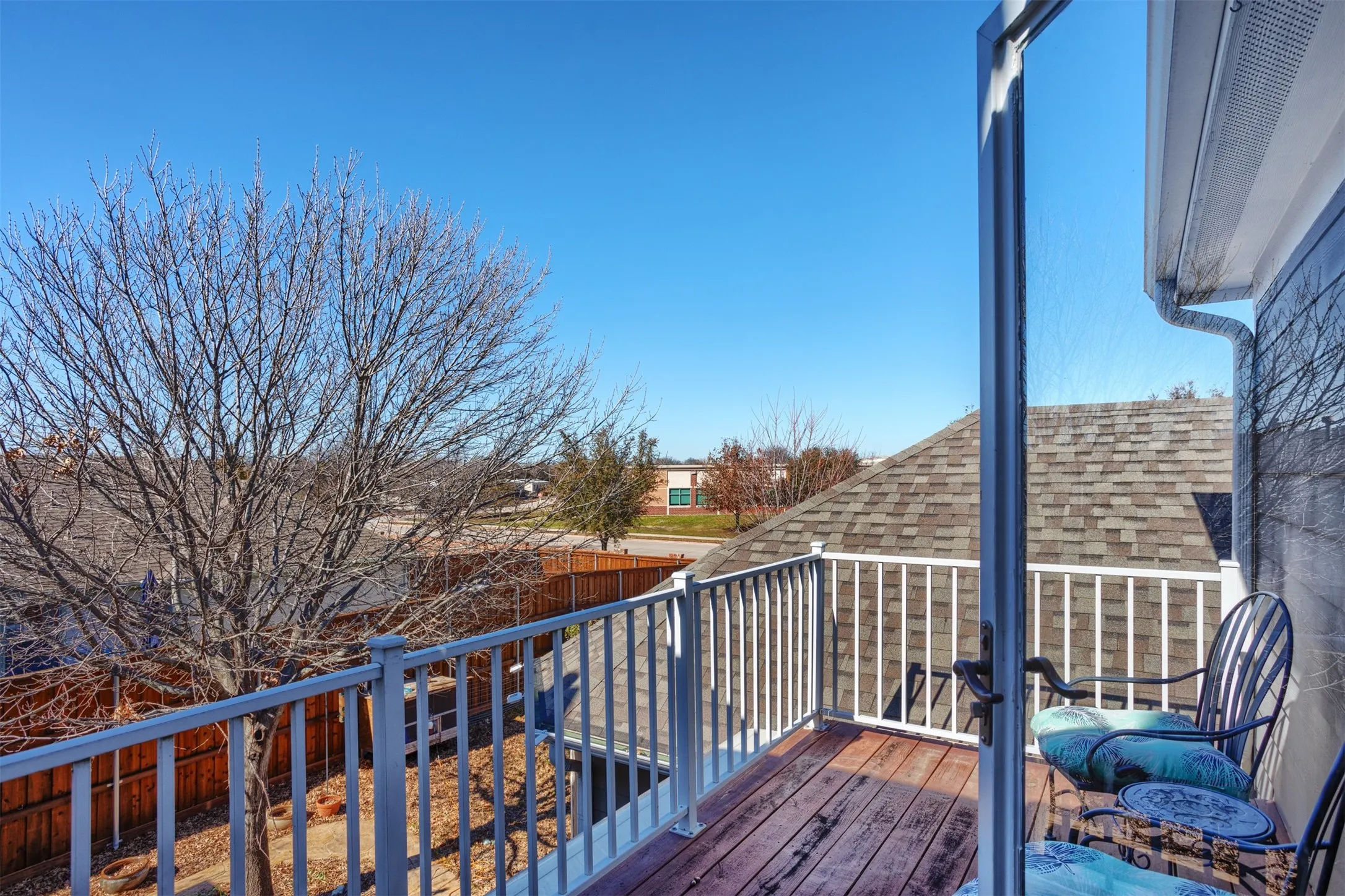 How nice is this? Just a perfect spot to sit and enjoy the great outdoors on this balcony!