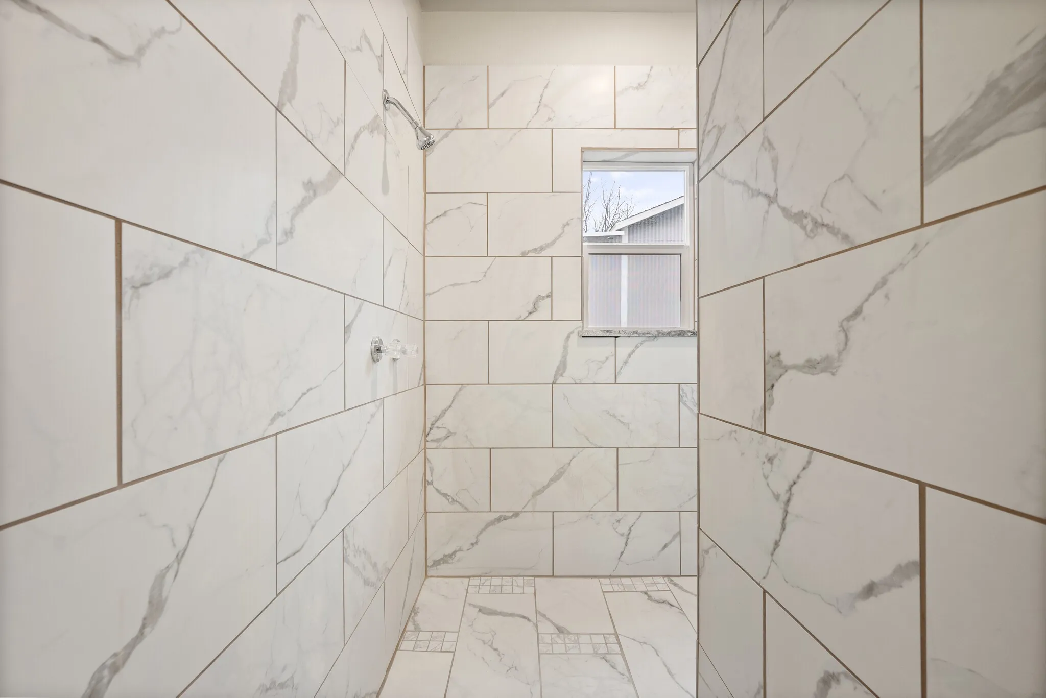 Bathroom with a tile shower