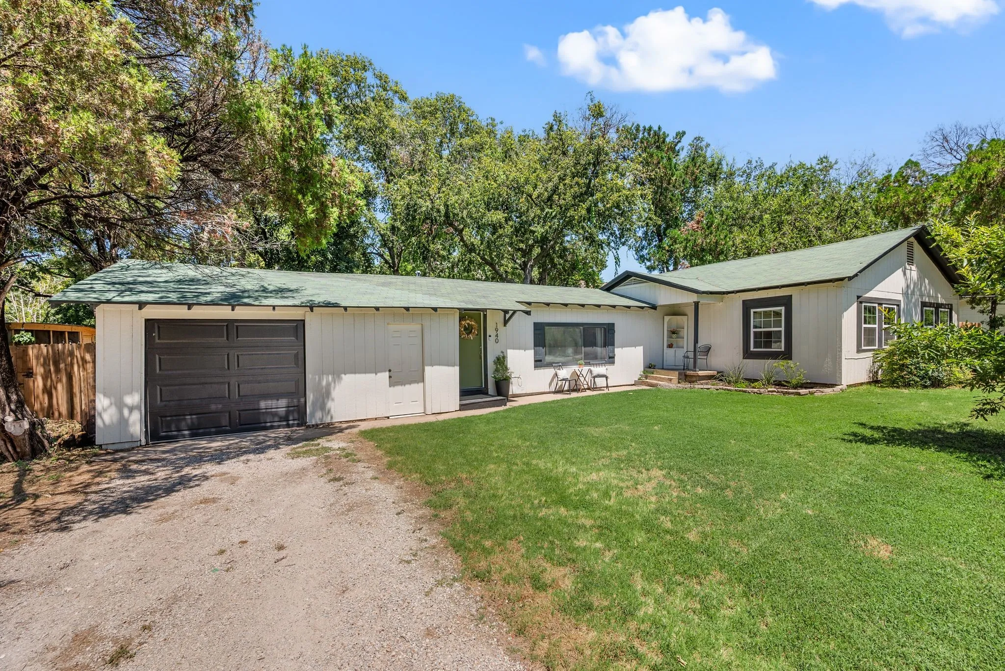 Single story home with an attached garage and driveway