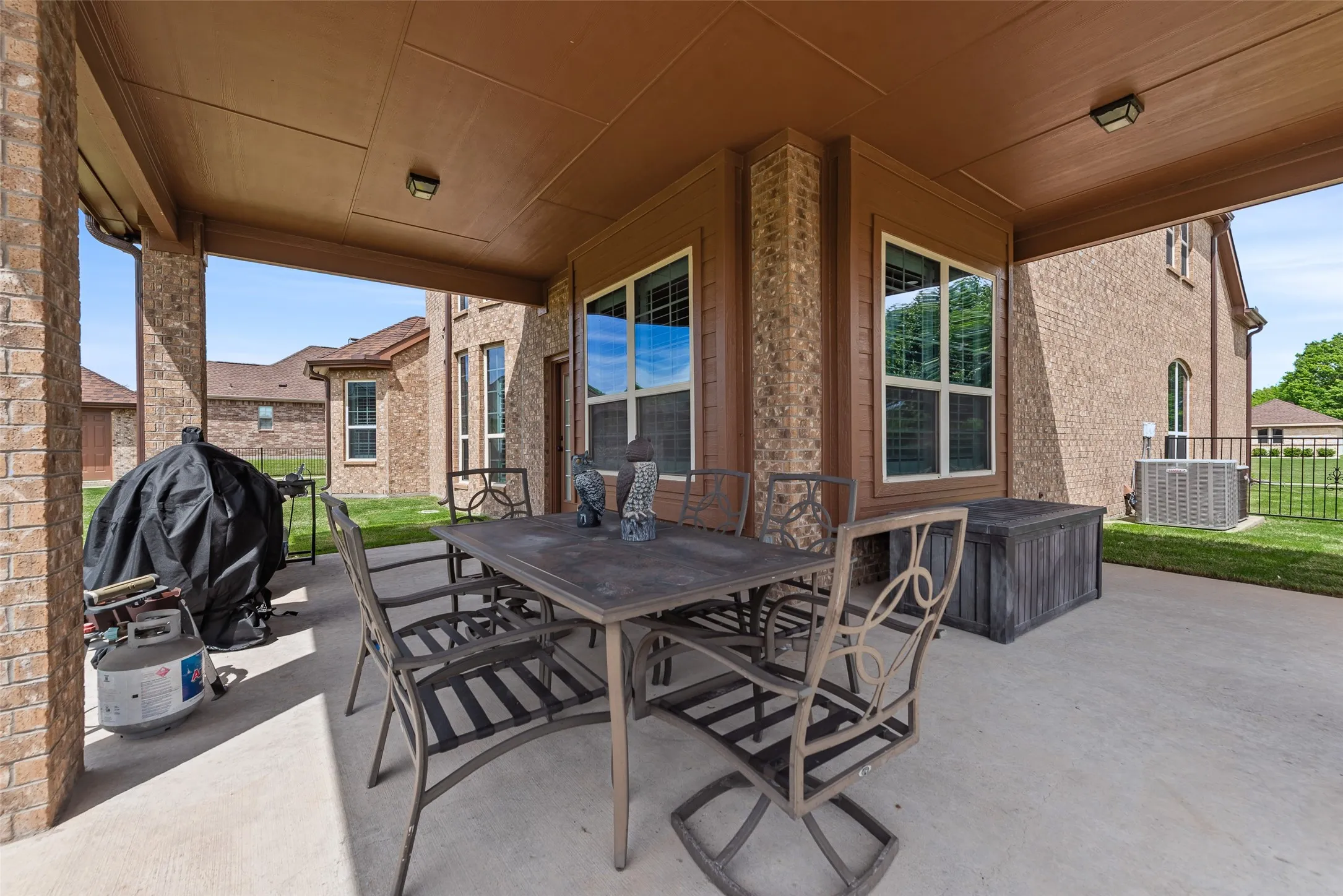 View of patio featuring outdoor dining area and area for grilling
