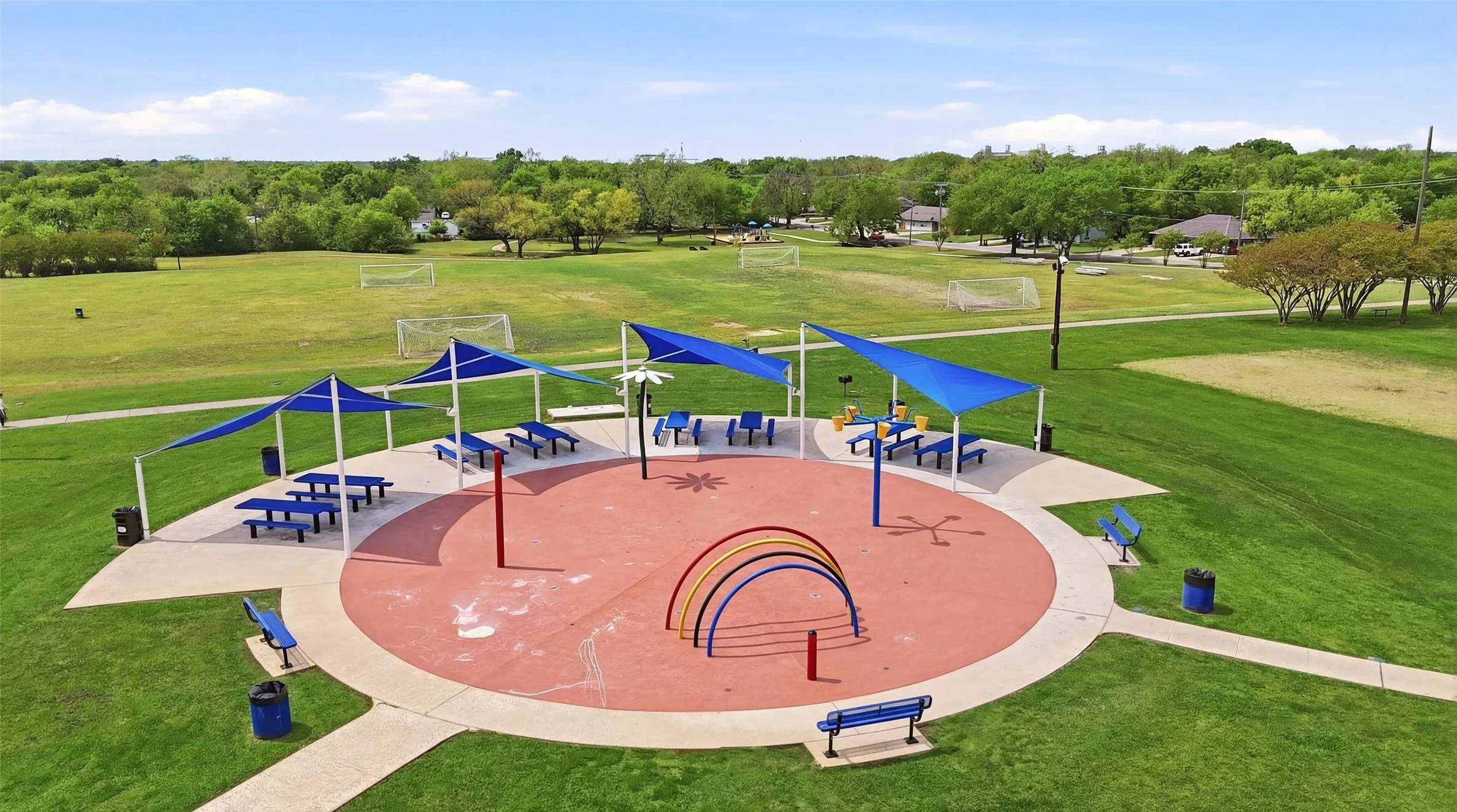 View of property's community featuring view of wooded area