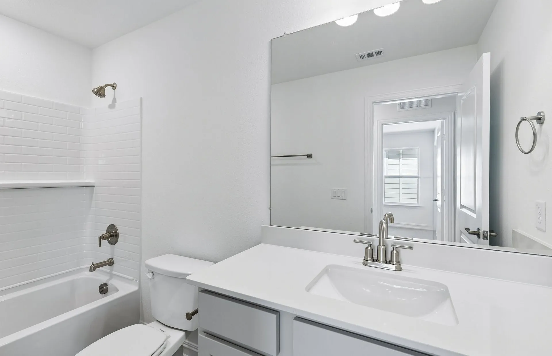 Secondary bath with tile surrounded shower