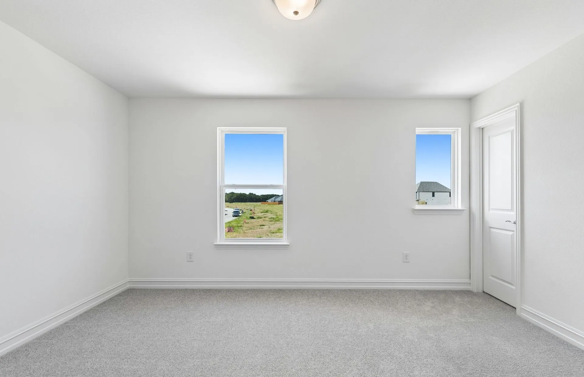 Secondary bedroom with large window