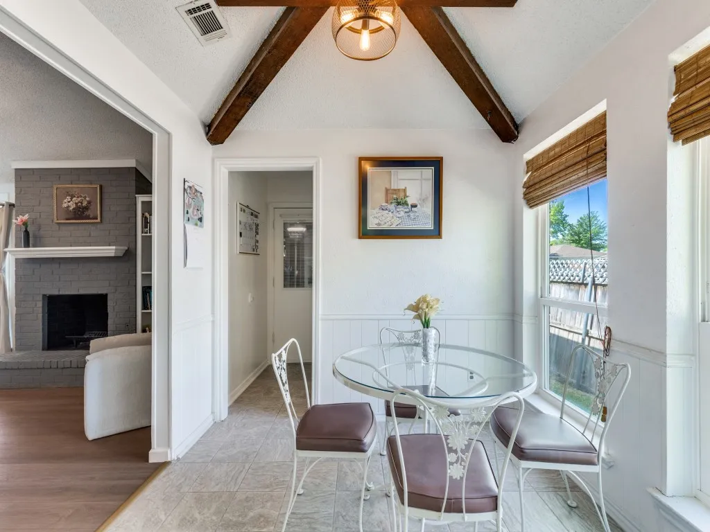The full-size laundry room with the garage access just beyond.