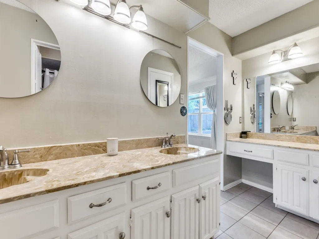 Dual sinks and separate vanities in the primary bath