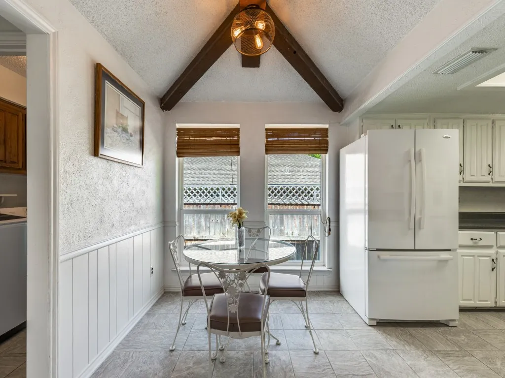 Bright breakfast area with the laundry room to the left.