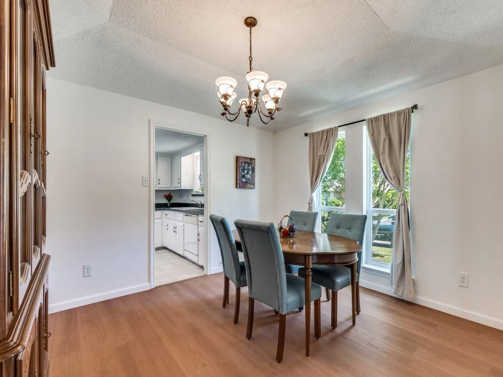 Formal dining to the right of the entry foyer