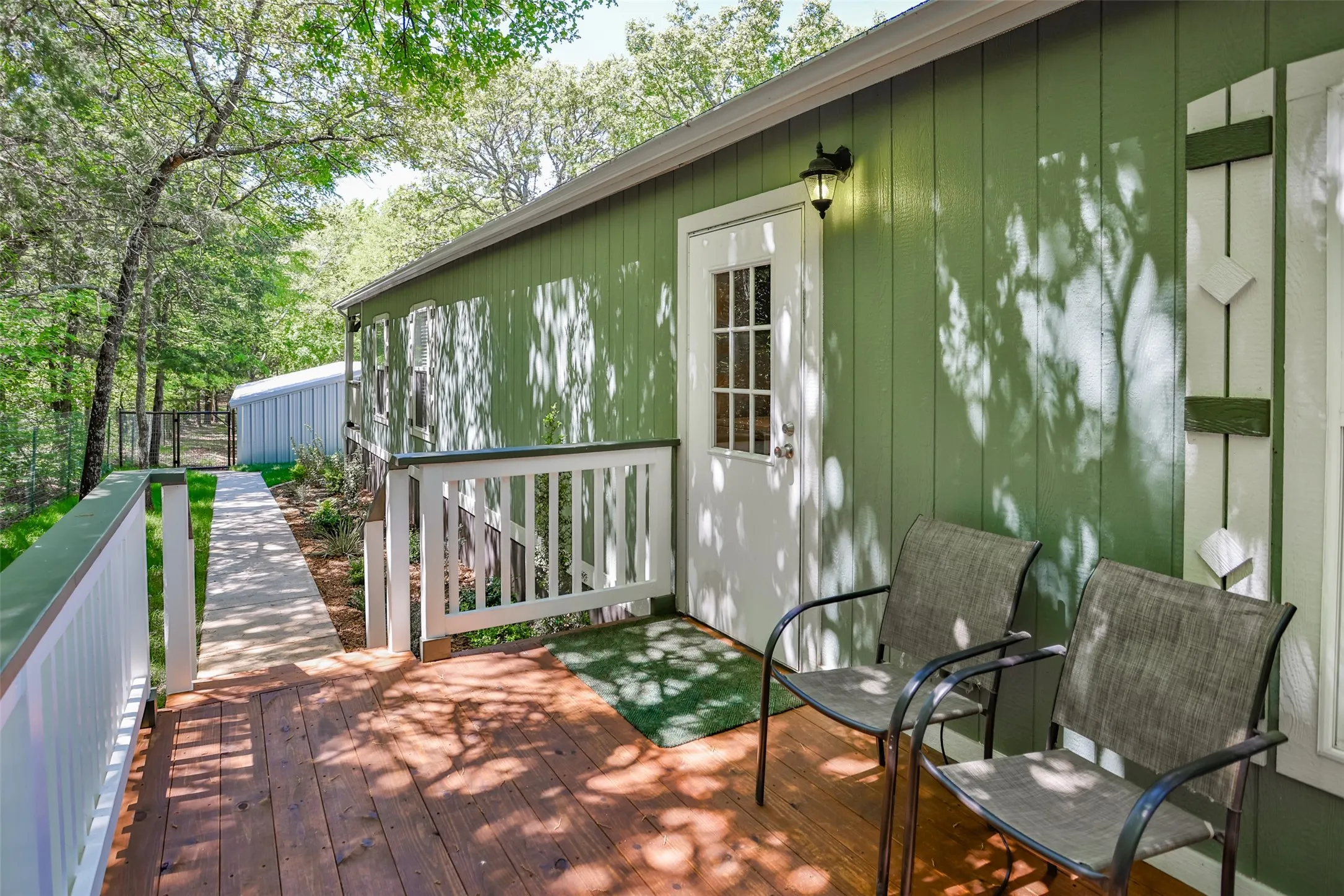 Back patio with stained wood and railings