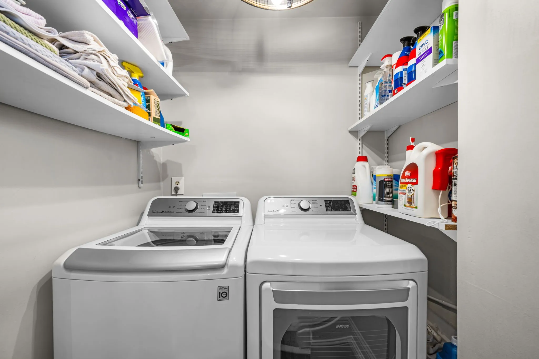 Laundry room with shelves