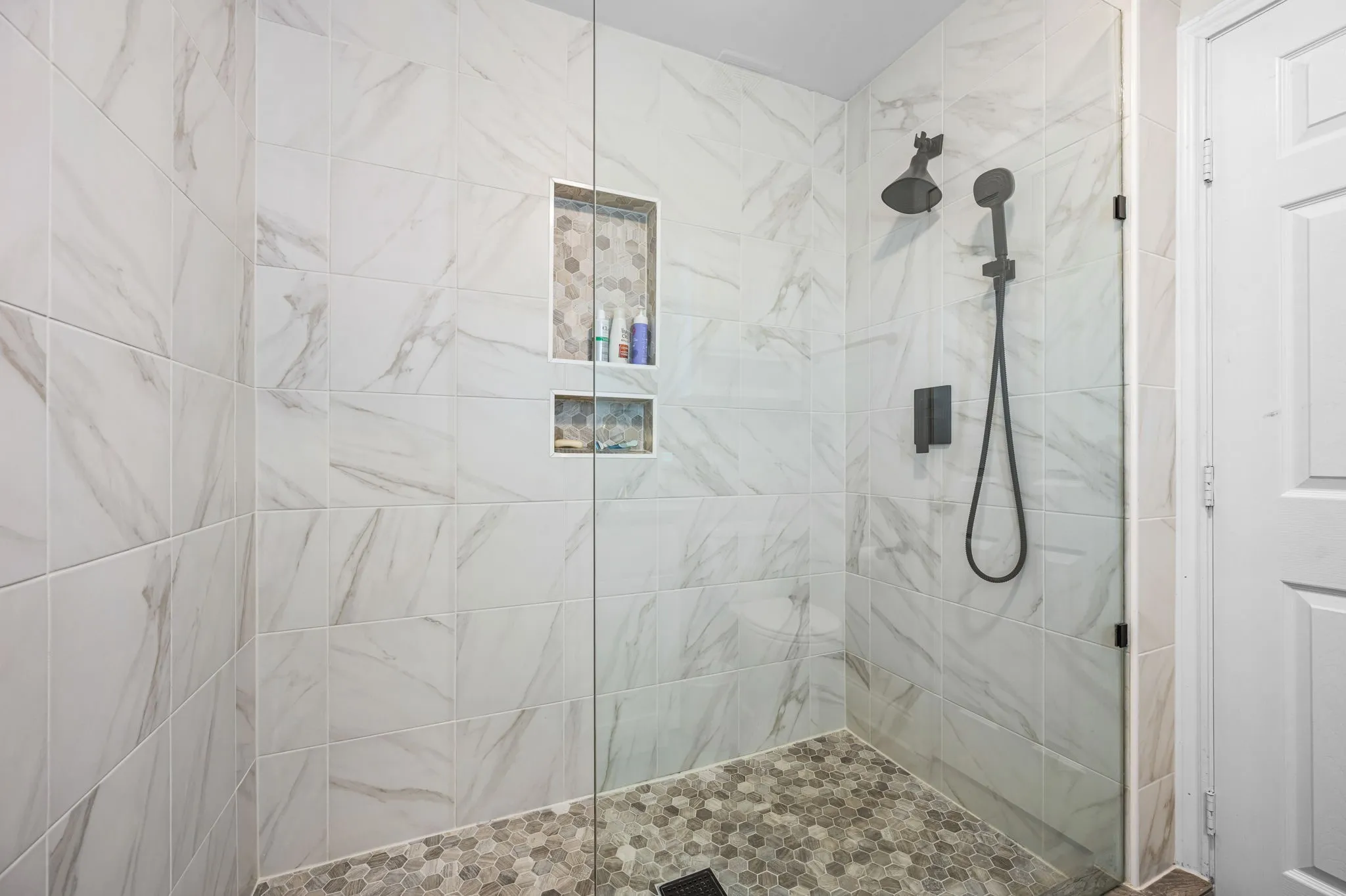 Amazing oversized shower in the ensuite primary bathroom.