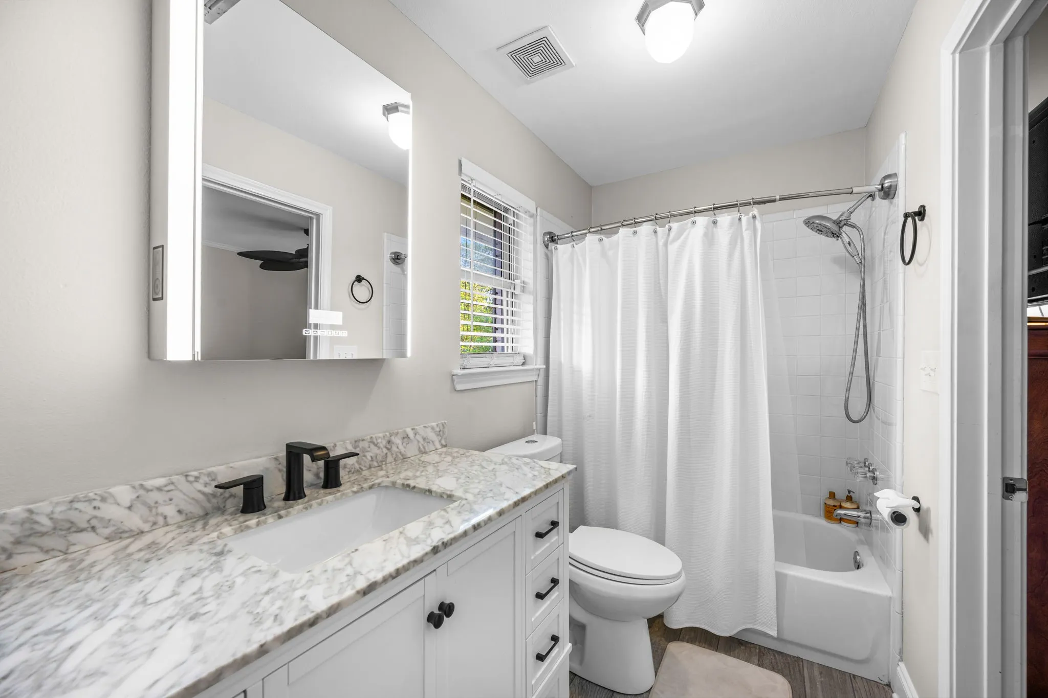 Jack and jill bathroom connecting bedrooms 2 and 3.