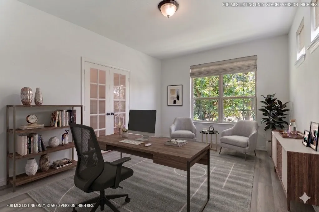 Office space with french doors and wood finished floors