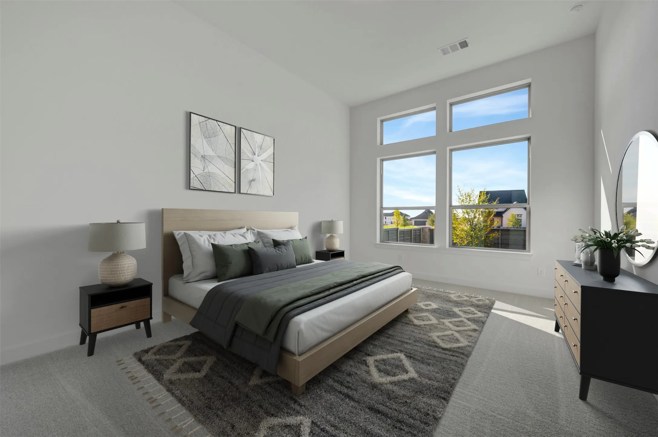 Room featuring a high ceiling, a multi-pane window configuration, and light-toned carpet flooring