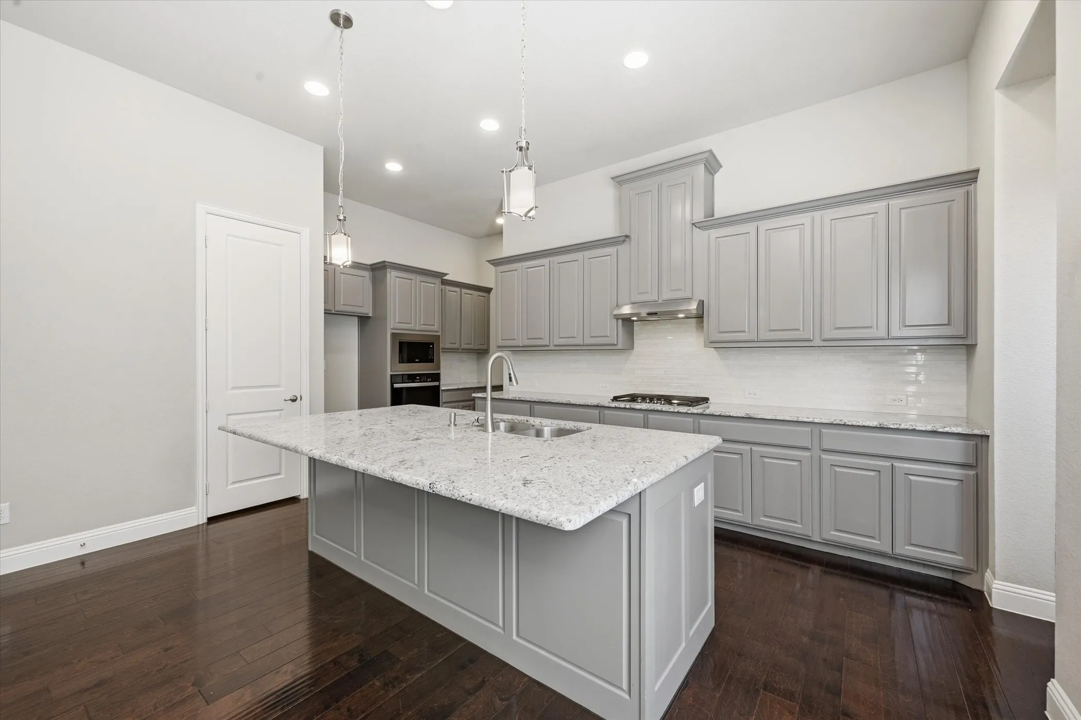 Oversized Island is Great for extra seating and space for prepping.