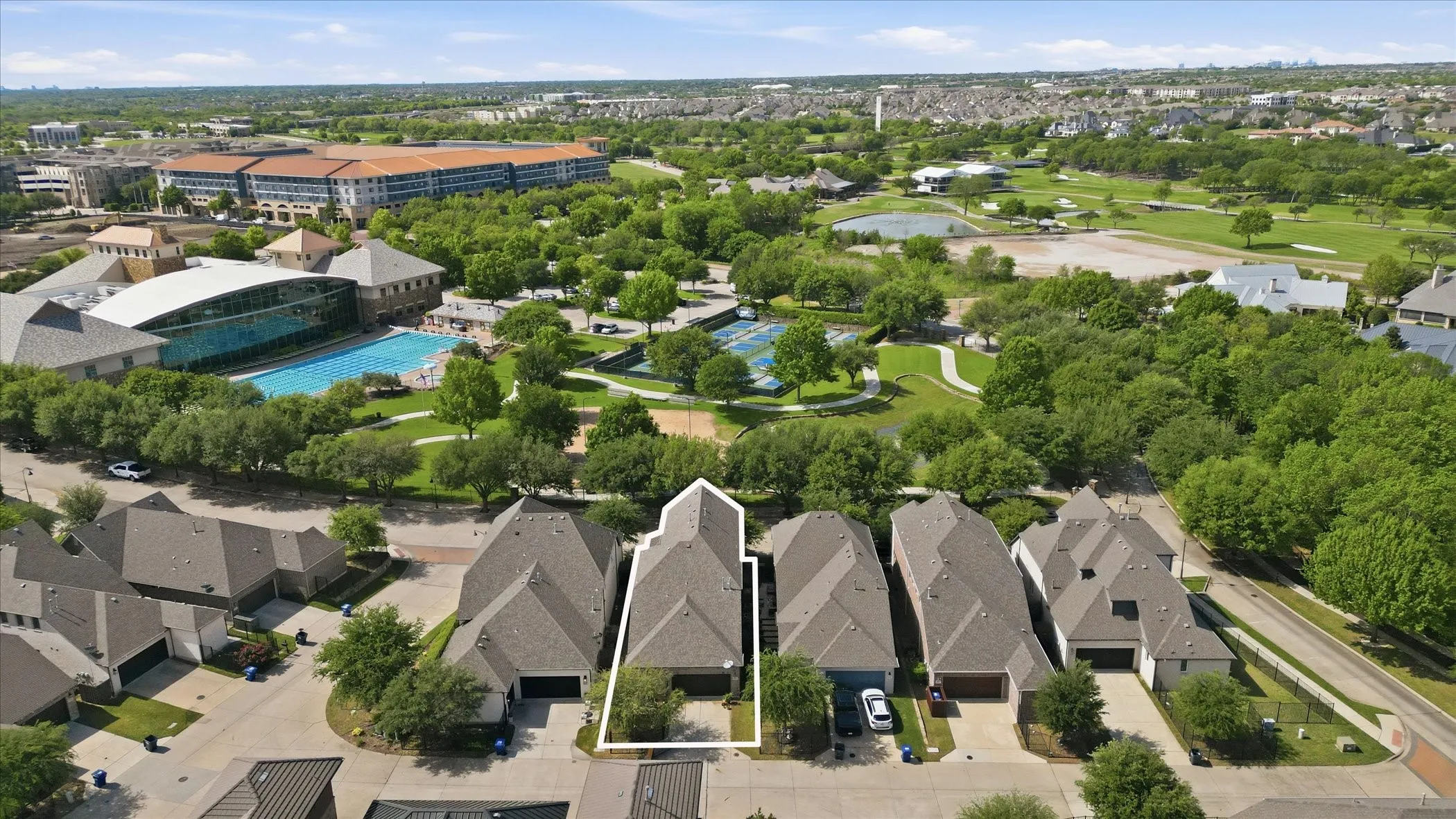 Right across from LifeTime Fitness, trails, and more!