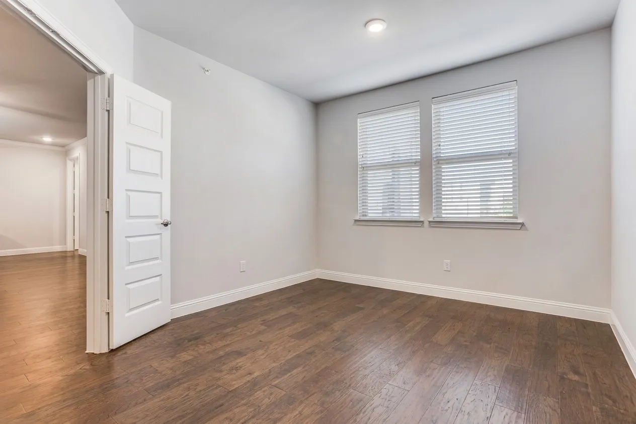 Dining room or private study with double doors.