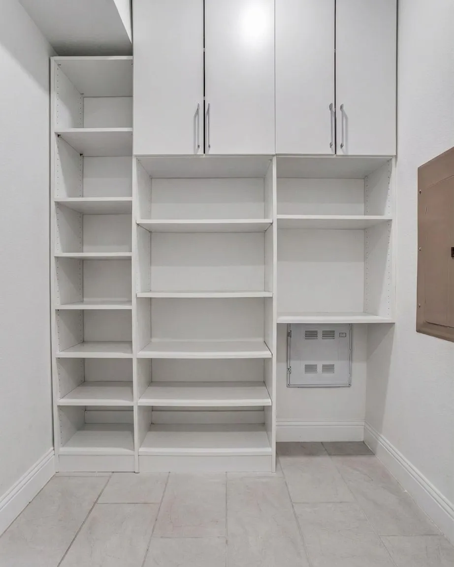 Custom designed pantry shelving & cabinets
